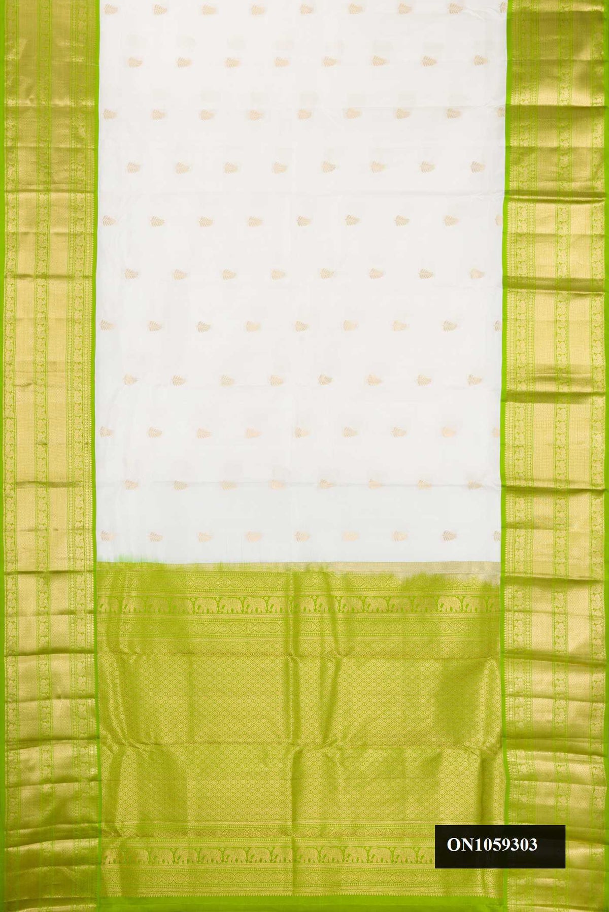White Dual Tone Kanchipuram Silk Saree with Zari Butta on the body and Zari Border.  displayed on a mannequin