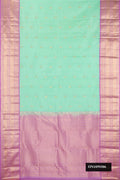Sea Green Dual Tone Kanchipuram Silk Saree with Zari Butta on the body and Zari Border.  displayed on a mannequin