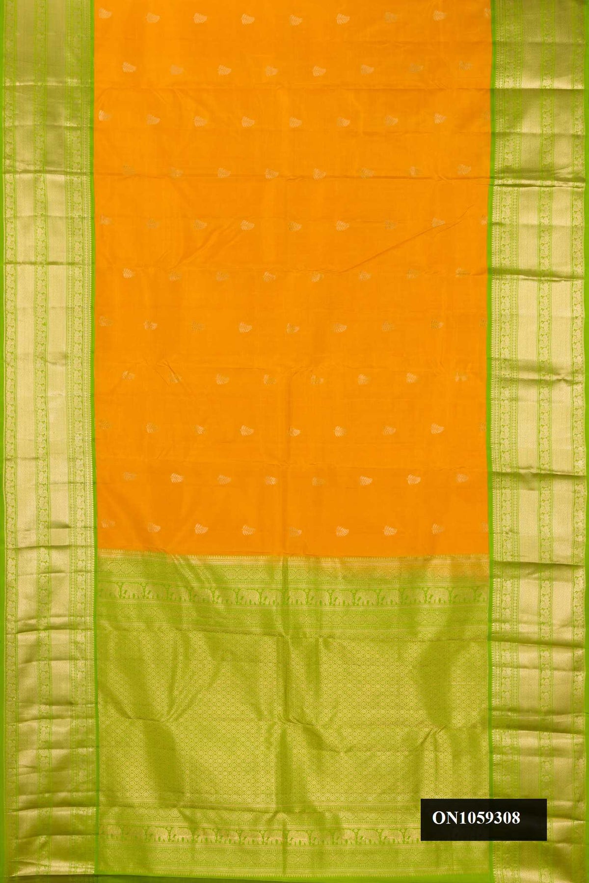 Mustard Dual Tone Kanchipuram Silk Saree with Zari Butta on the body and Zari Border.  displayed on a mannequin