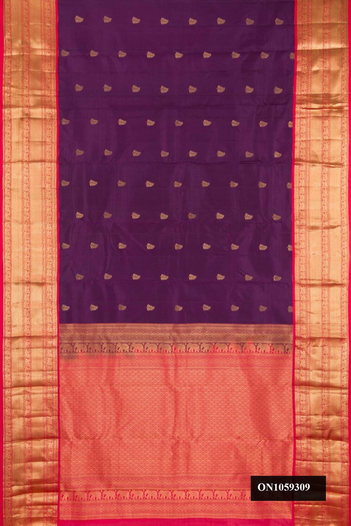 Purple Dual Tone Kanchipuram Silk Saree with Zari Butta on the body and Zari Border.  displayed on a mannequin