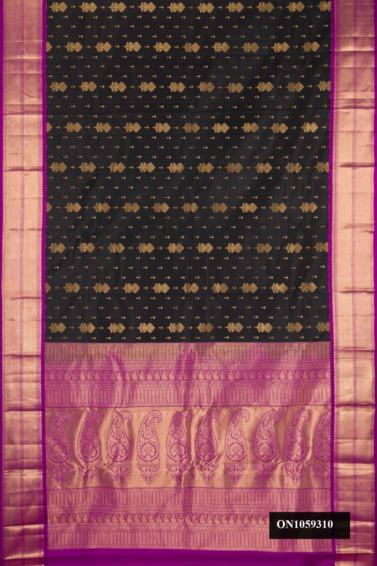 Black Dual Tone Kanchipuram Silk Saree with Zari Butta on the body and Zari Border.  displayed on a mannequin
