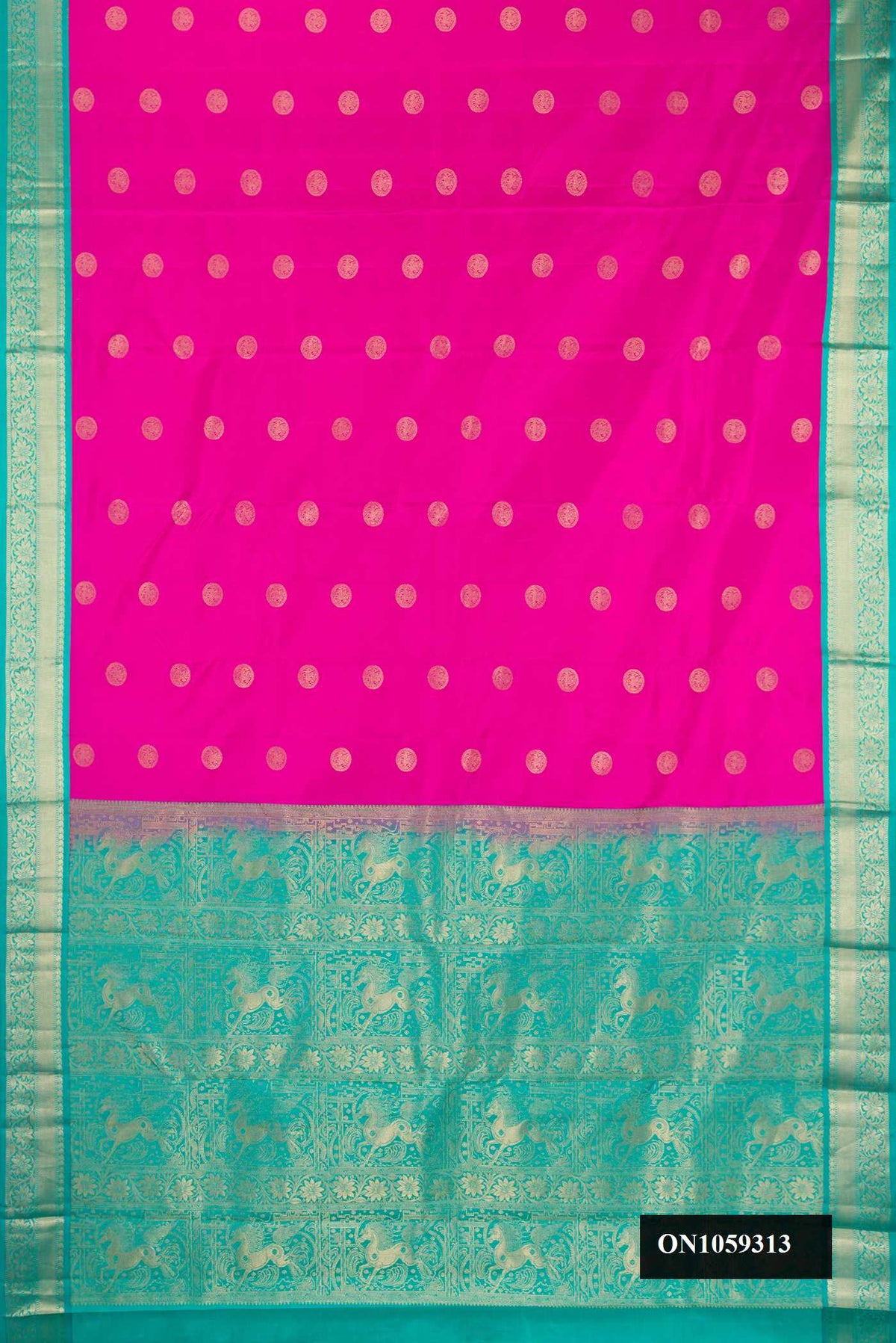 Dark Pink Dual Tone Kanchipuram Silk Saree with Zari Butta on the body and Zari Border.  displayed on a mannequin