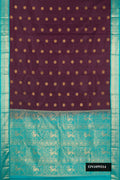 Coffee Brown Dual Tone Kanchipuram Silk Saree with Zari Butta on the body and Zari Border.  displayed on a mannequin