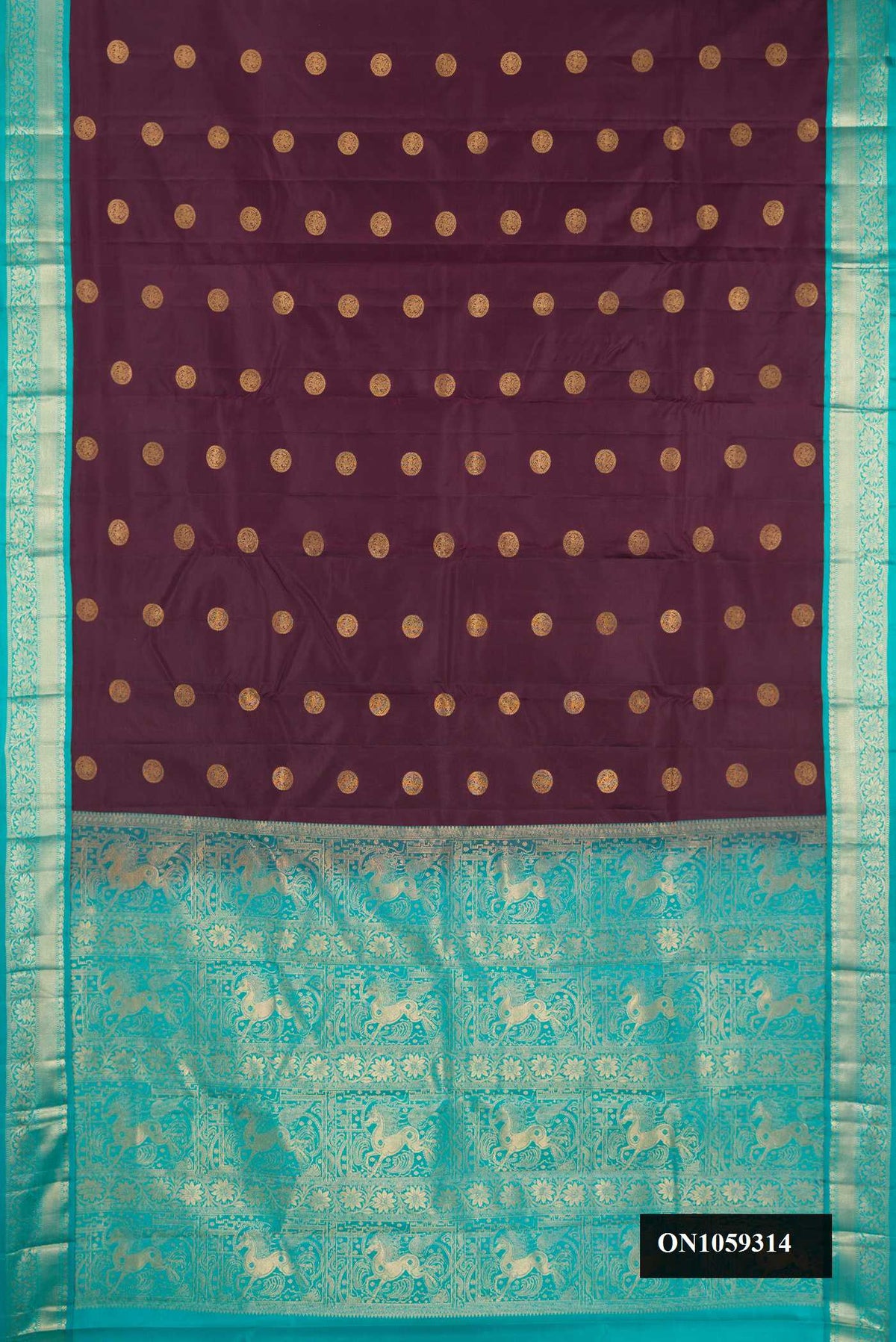 Coffee Brown Dual Tone Kanchipuram Silk Saree with Zari Butta on the body and Zari Border.  displayed on a mannequin
