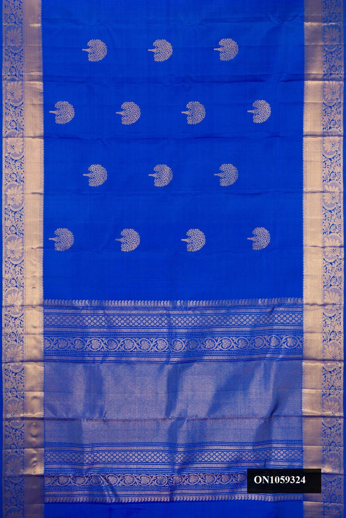 Royal Blue Dual Tone Kanchipuram Silk Saree with Zari Butta on the body and Fancy Border.  displayed on a mannequin