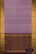 Lavender Dual Tone Kanchipuram Silk Saree with Zari Butta on the body and Zari Border.  displayed on a mannequin