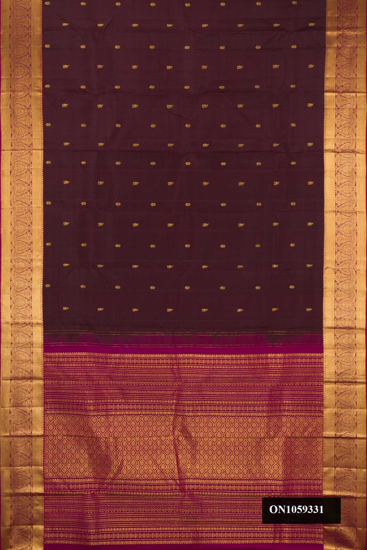 Coffee Brown Dual Tone Kanchipuram Silk Saree with Zari Butta on the body and Zari Border.  displayed on a mannequin