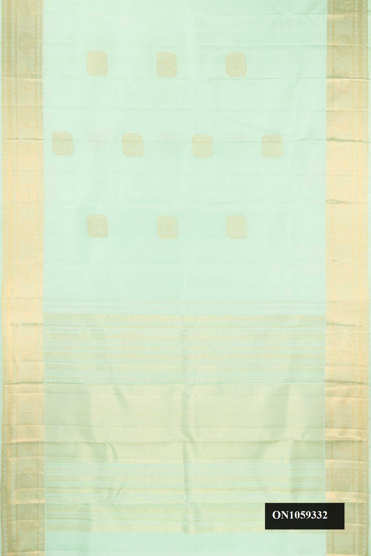 Pista Green Dual Tone Kanchipuram Silk Saree with Zari Butta on the body and Zari Border.  displayed on a mannequin
