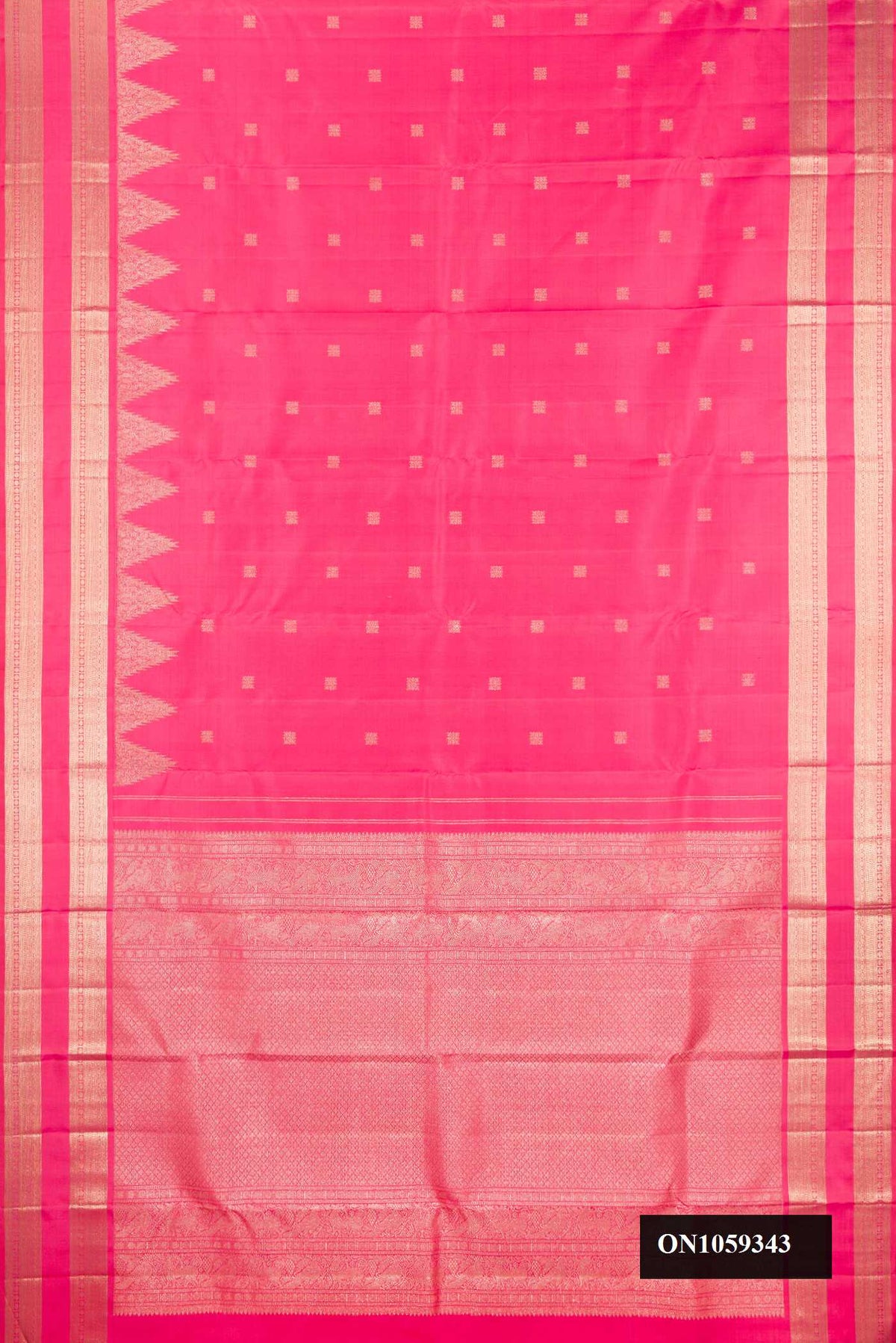 Rose pink Dual Tone Kanchipuram Silk Saree with Zari Butta on the body and Fancy Border.  displayed on a mannequin