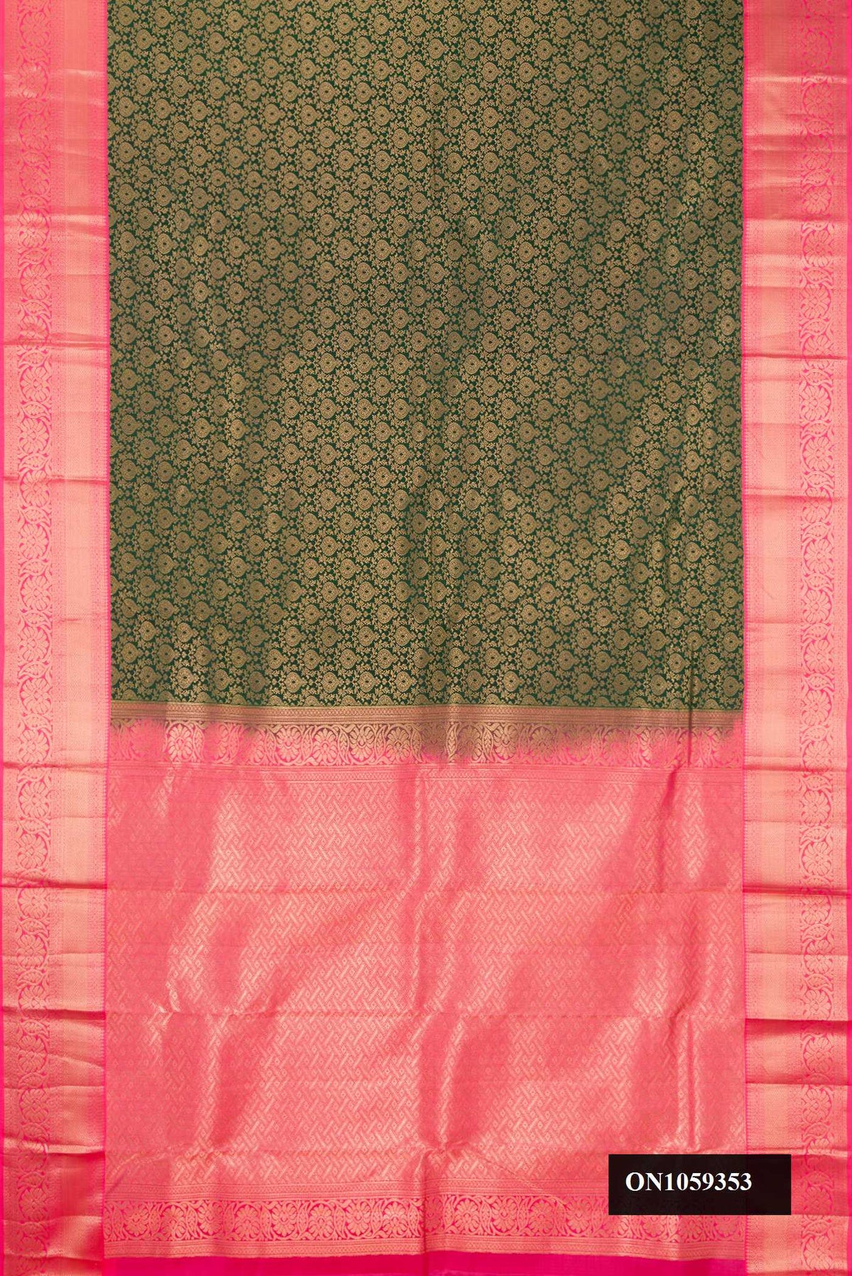 Green Dual Tone Kanchipuram Silk Saree with Zari Brocade on the body and Zari Border.  displayed on a mannequin