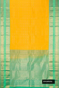Yellow Dual Tone Kanchipuram Silk Saree with Zari Brocade on the body and Zari Border.  displayed on a mannequin