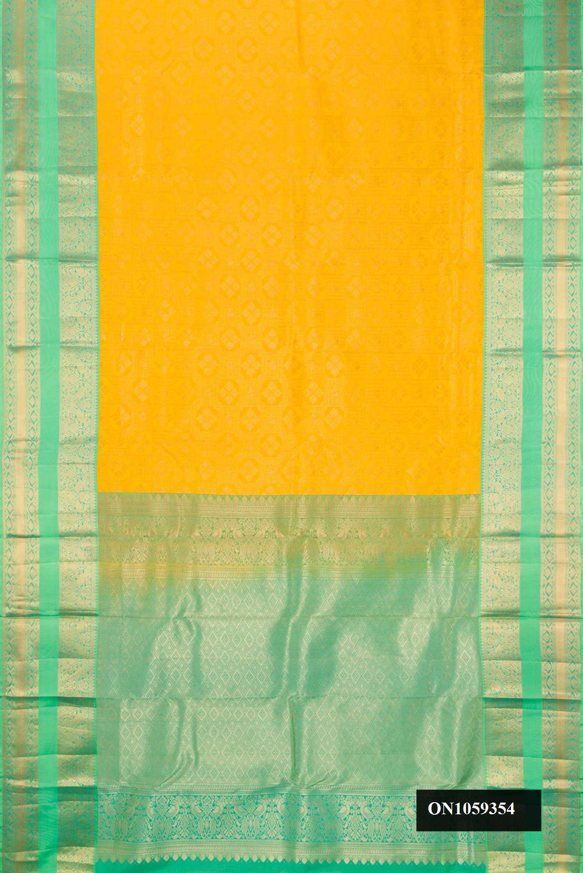 Yellow Dual Tone Kanchipuram Silk Saree with Zari Brocade on the body and Zari Border.  displayed on a mannequin