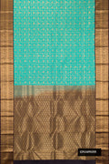 Sky Blue Dual Tone Kanchipuram Silk Saree with Zari Brocade on the body and Zari Border.  displayed on a mannequin