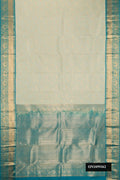 Beige Dual Tone Kanchipuram Silk Saree with Zari Brocade on the body and Zari Border.  displayed on a mannequin