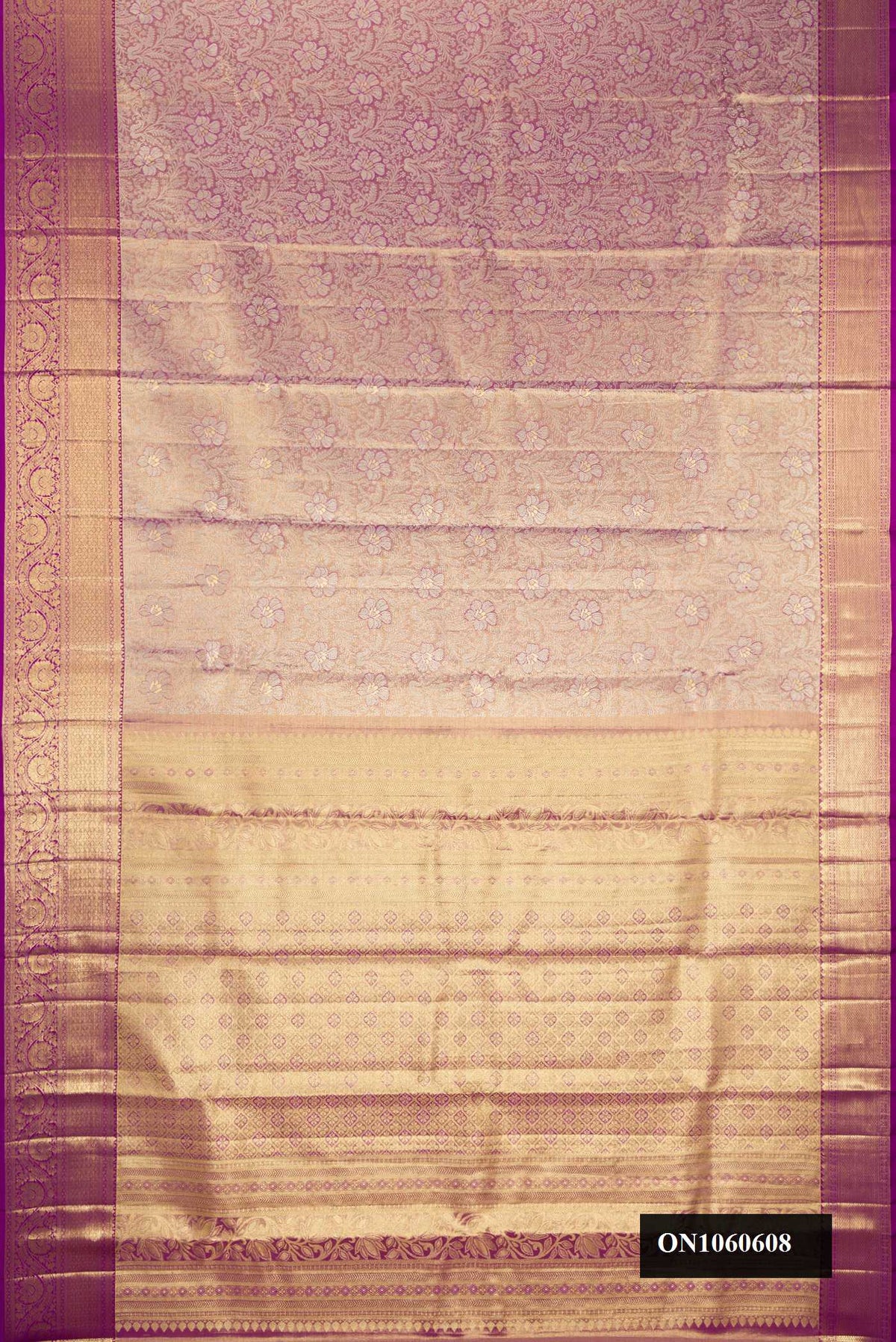 Purple Dual Tone Kanchipuram Tissue Silk Saree with Zari Brocade on the body and Zari Border.  displayed on a mannequin