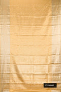 Gold Dual Tone Kanchipuram Tissue Silk Saree with Zari Brocade on the body and Zari Border.  displayed on a mannequin