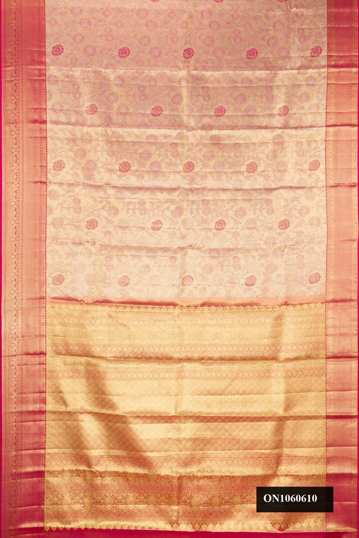Dark Pink Dual Tone Kanchipuram Tissue Silk Saree with Zari Brocade on the body and Zari Border.  displayed on a mannequin