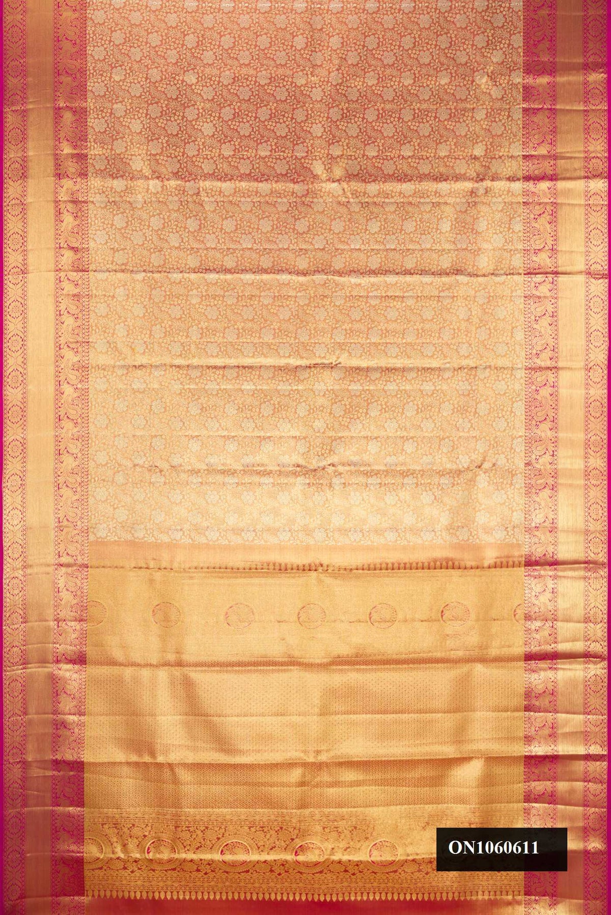 Dark Pink Dual Tone Kanchipuram Tissue Silk Saree with Zari Brocade on the body and Zari Border.  displayed on a mannequin