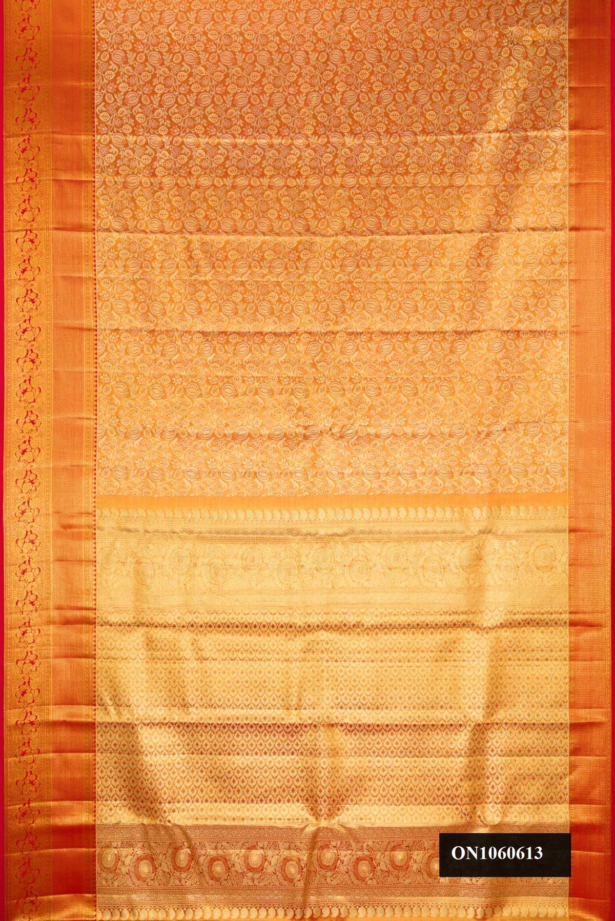 Orange Dual Tone Kanchipuram Tissue Silk Saree with Zari Brocade on the body and Zari Border.  displayed on a mannequin