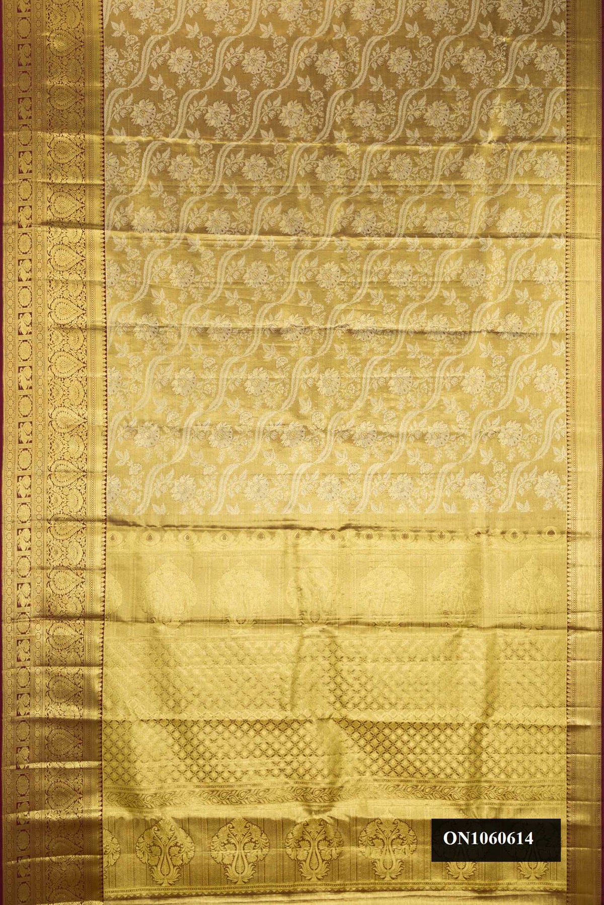 Mehandi Green Dual Tone Kanchipuram Tissue Silk Saree with Zari Brocade on the body and Zari Border.  displayed on a mannequin