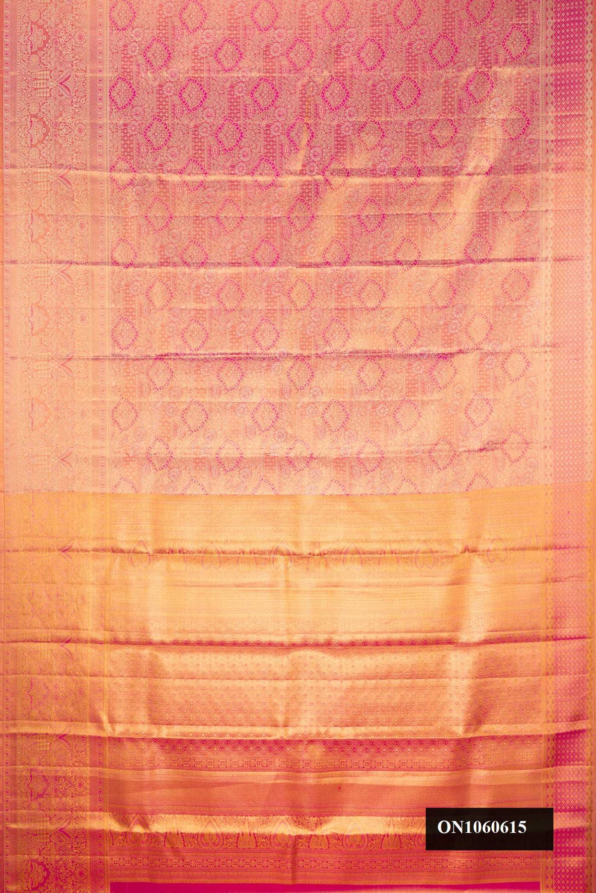 Pink Dual Tone Kanchipuram Tissue Silk Saree with Zari Brocade on the body and Zari Border.  displayed on a mannequin