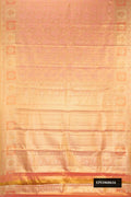 Rose Gold Dual Tone Kanchipuram Tissue Silk Saree with Zari Brocade on the body and Zari Border.  displayed on a mannequin