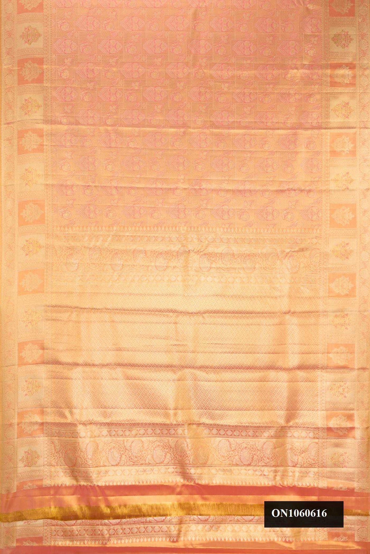 Rose Gold Dual Tone Kanchipuram Tissue Silk Saree with Zari Brocade on the body and Zari Border.  displayed on a mannequin