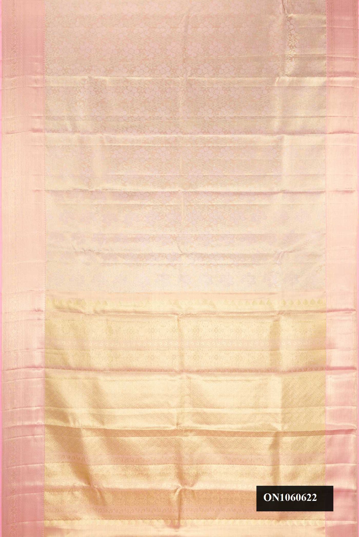 Rose pink Dual Tone Kanchipuram Tissue Silk Saree with Zari Brocade on the body and Zari Border.  displayed on a mannequin
