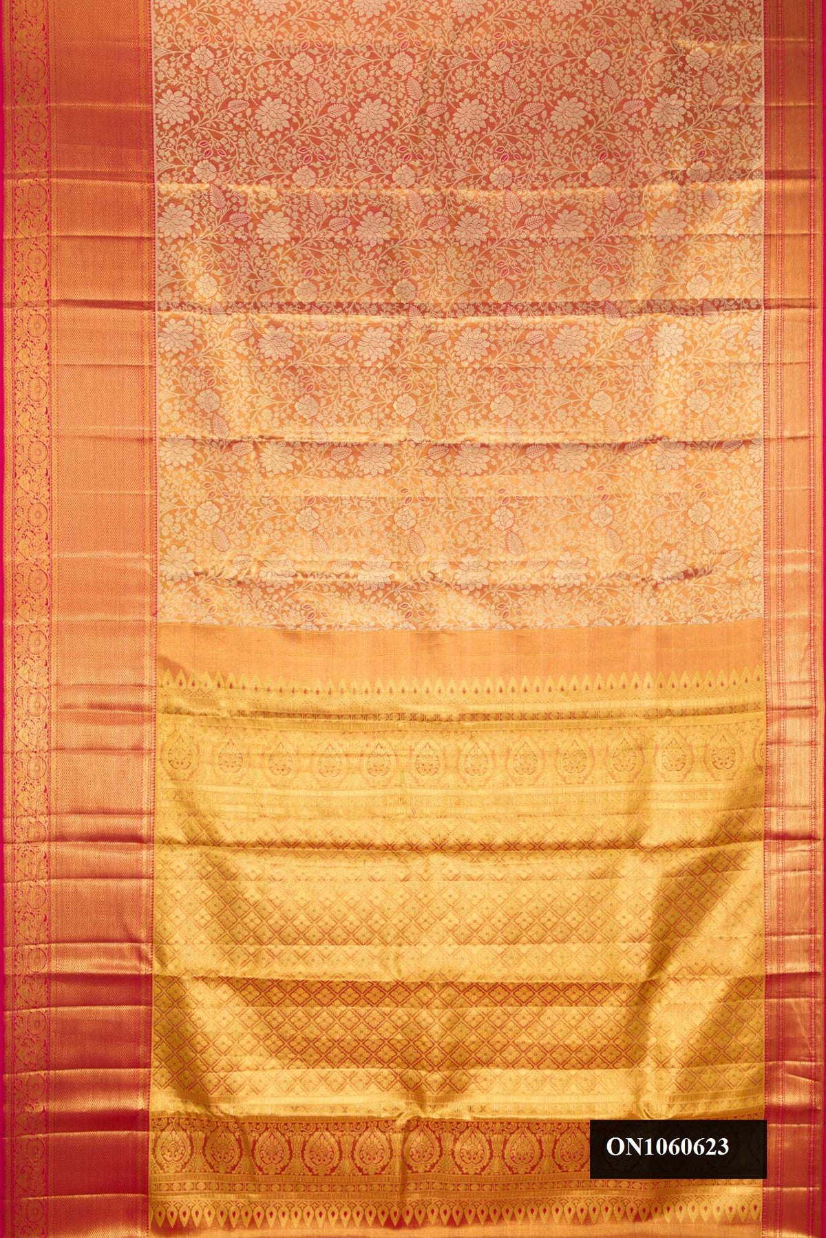 Dark Pink Dual Tone Kanchipuram Tissue Silk Saree with Zari Brocade on the body and Zari Border.  displayed on a mannequin