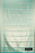 Light Blue Dual Tone Kanchipuram Tissue Silk Saree with Zari Brocade on the body and Zari Border.  displayed on a mannequin