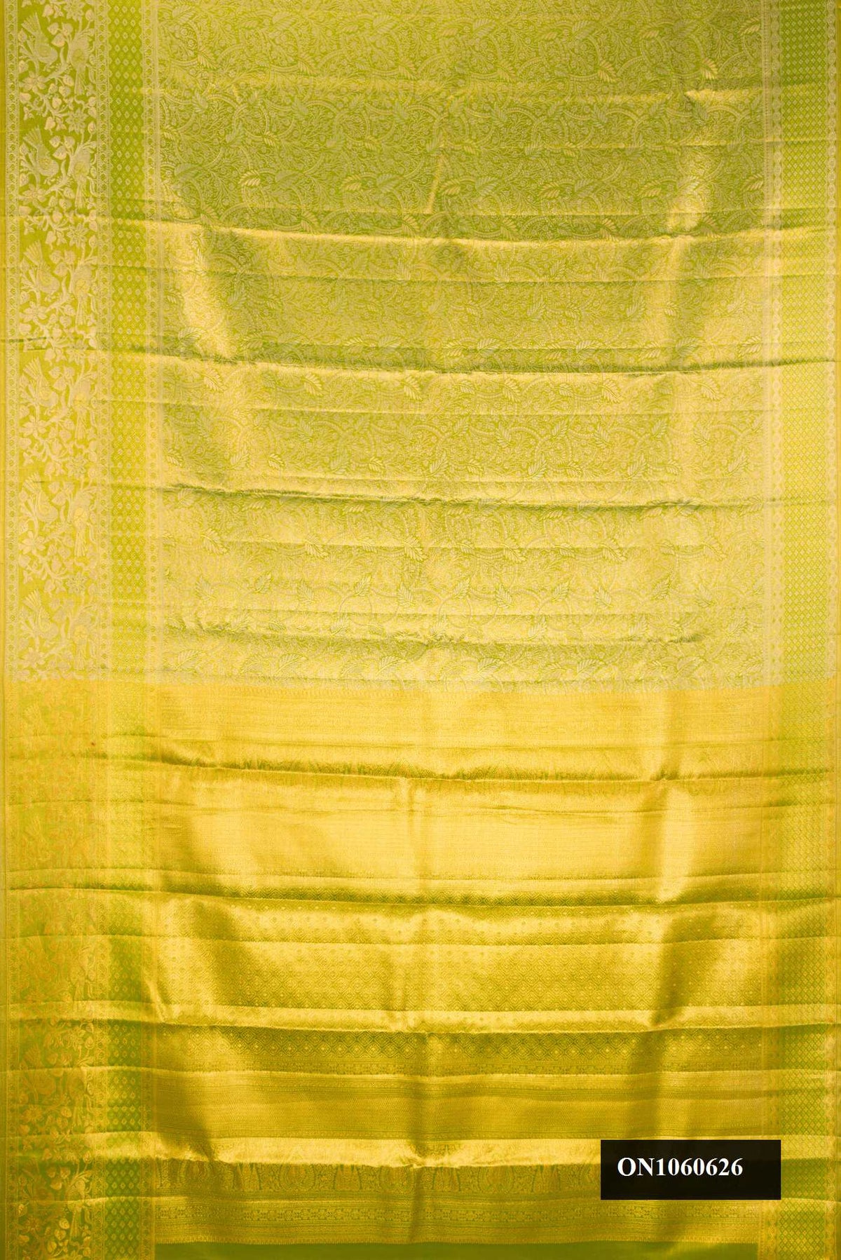 Parrot Green Dual Tone Kanchipuram Tissue Silk Saree with Zari Brocade on the body and Zari Border.  displayed on a mannequin