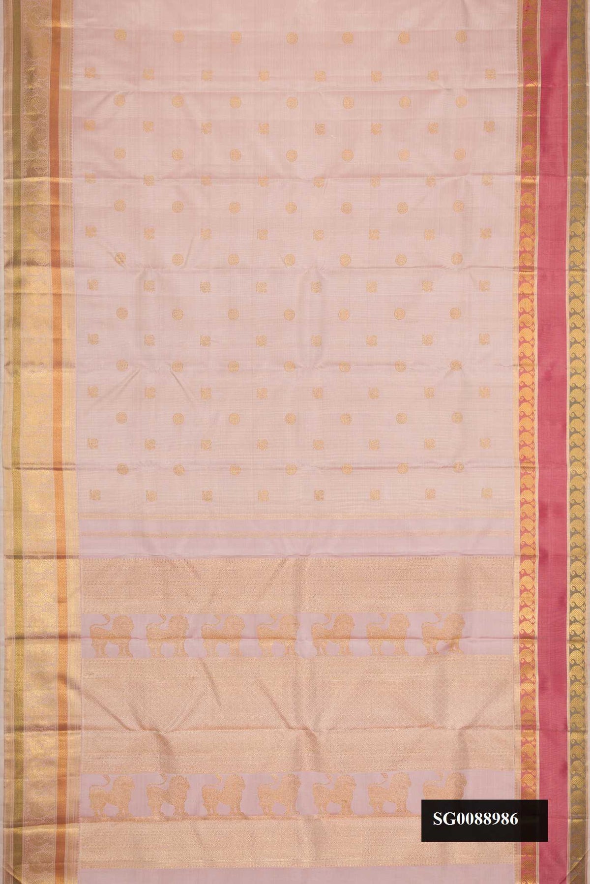 Lilac Dual Tone Kanchipuram Silk Saree with Zari Butta on the body and Zari Border.  displayed on a mannequin
