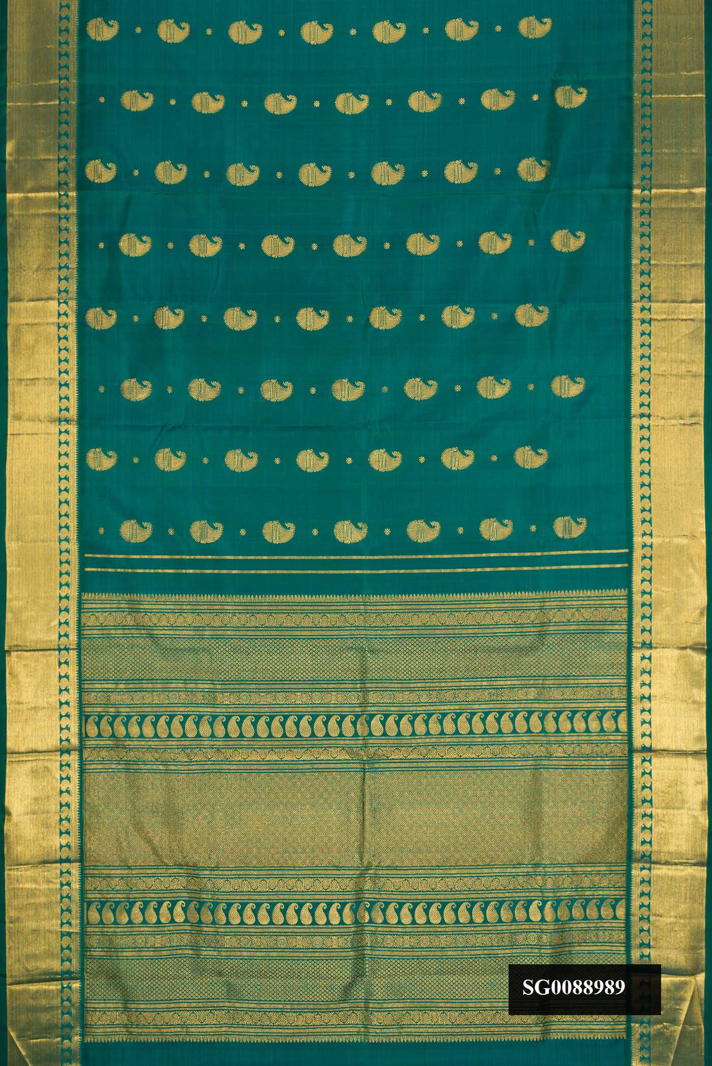 Green Dual Tone Kanchipuram Silk Saree with Zari Butta on the body and Zari Border.  displayed on a mannequin