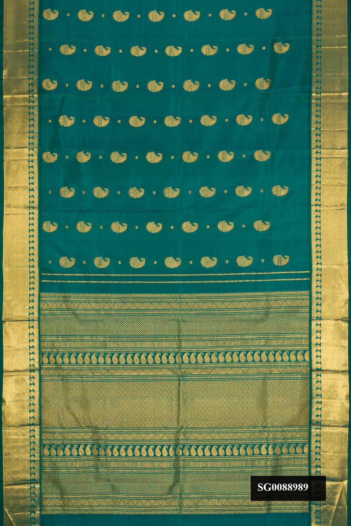 Green Dual Tone Kanchipuram Silk Saree with Zari Butta on the body and Zari Border.  displayed on a mannequin