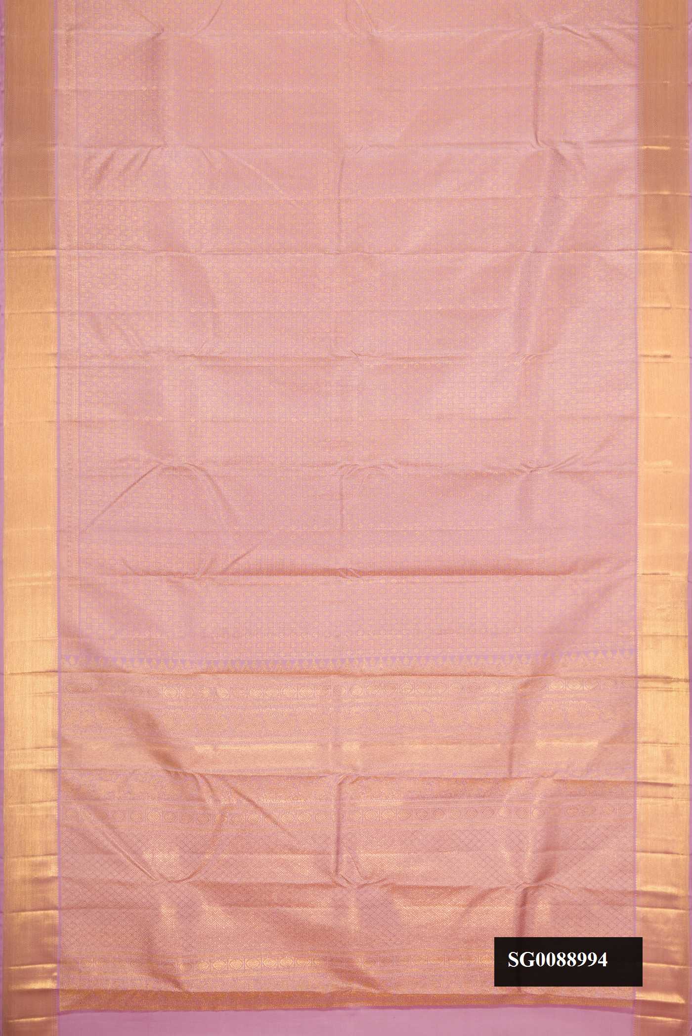 Lavender Dual Tone Kanchipuram Silk Saree with Zari Brocade on the body and Zari Border.  displayed on a mannequin
