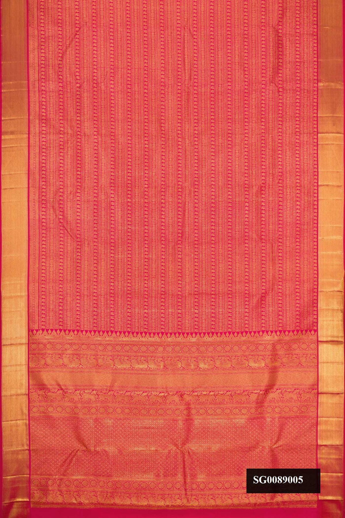 Dark Pink Dual Tone Kanchipuram Silk Saree with Zari Brocade on the body and Zari Border.  displayed on a mannequin