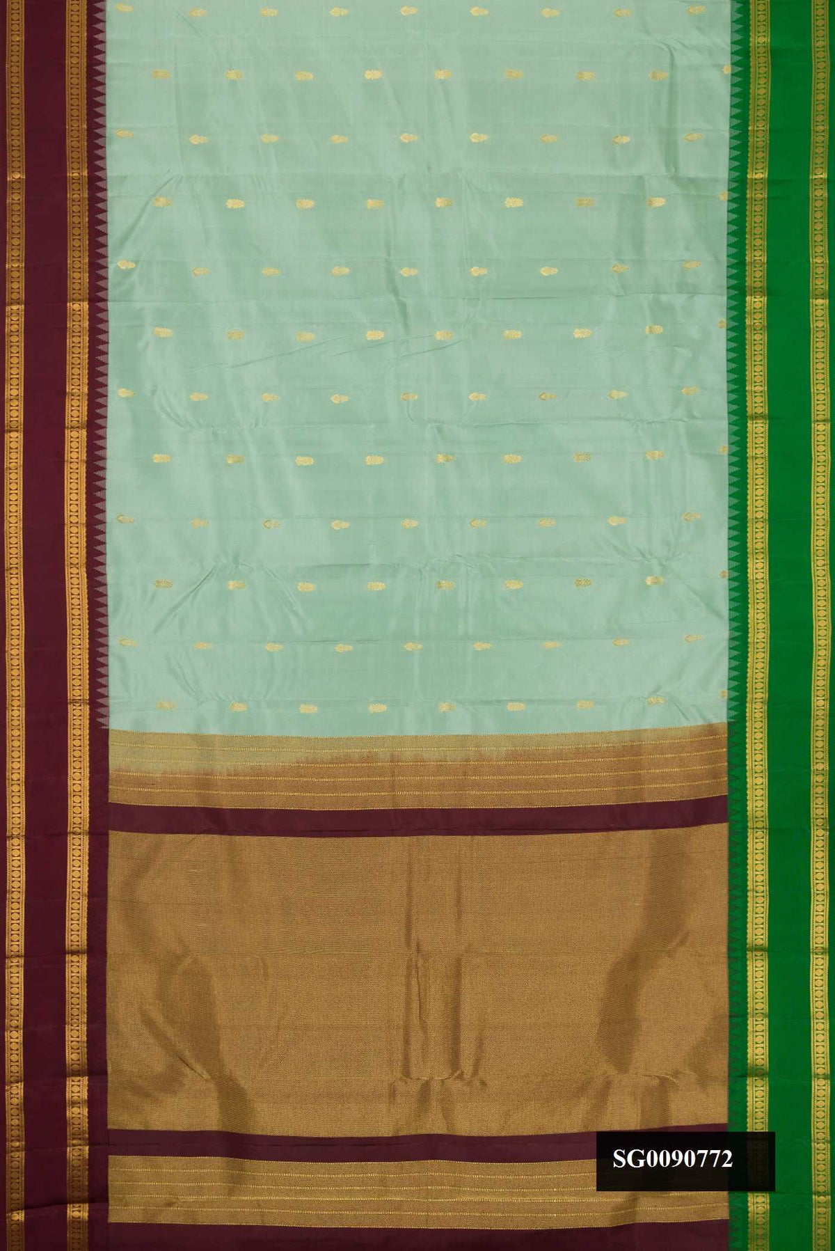 Sea Green Dual Tone Kanchipuram Silk Saree with Zari Butta on the body and Ganga Jamuna Border.  displayed on a mannequin