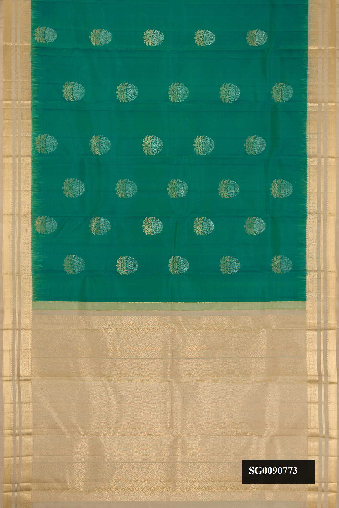 Green Dual Tone Kanchipuram Silk Saree with Zari Butta on the body and Zari Border.  displayed on a mannequin