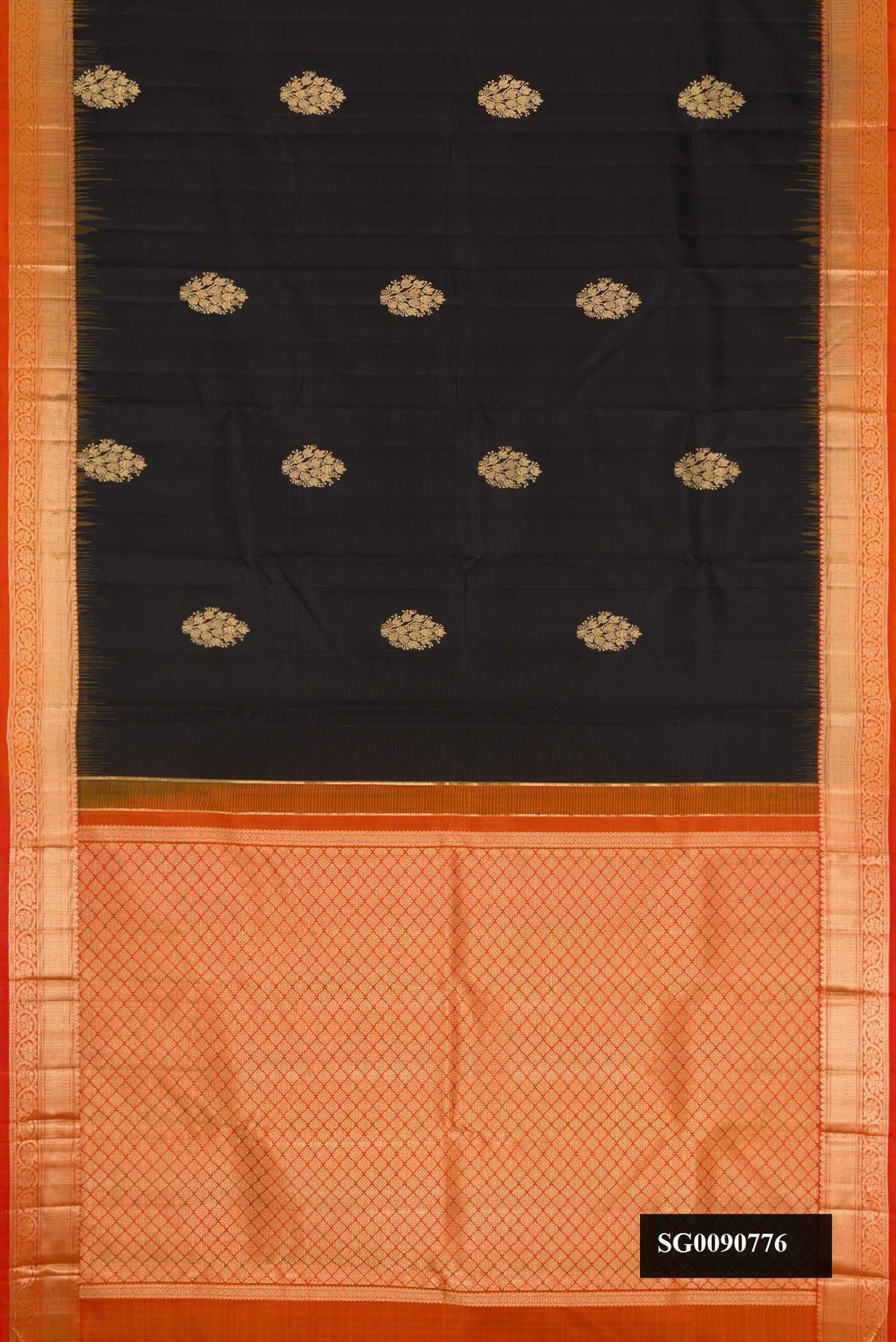 Black Dual Tone Kanchipuram Silk Saree with Zari Butta on the body and Zari Border.  displayed on a mannequin