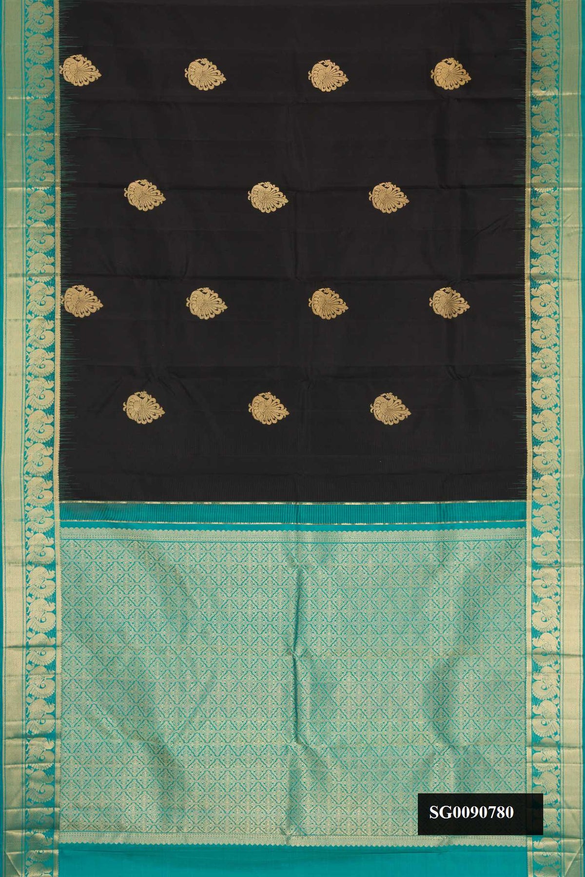 Black Dual Tone Kanchipuram Silk Saree with Zari Butta on the body and Zari Border.  displayed on a mannequin