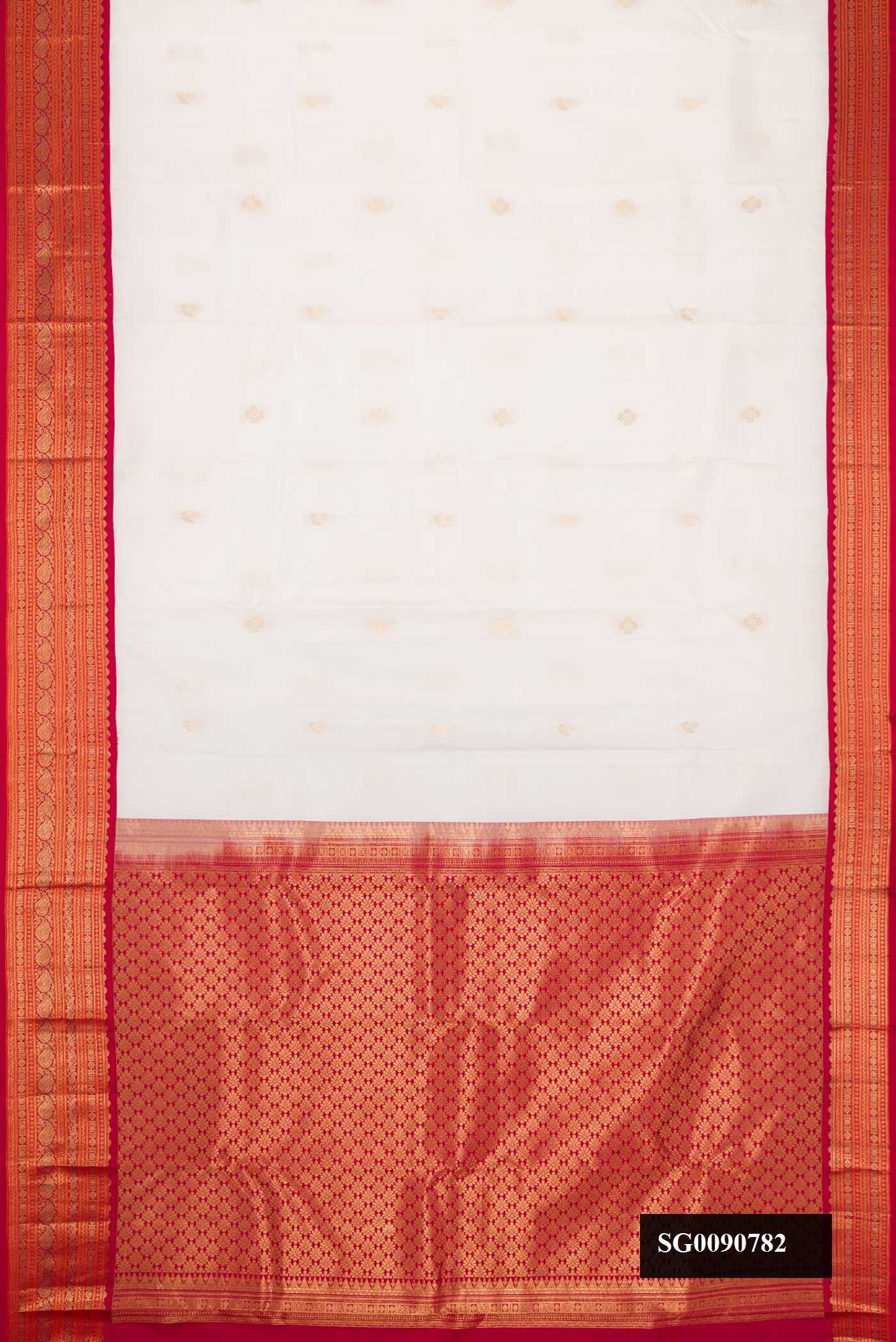 White Kanchipuram Silk Saree with Zari Butta on the body and Zari Border.  displayed on a mannequin