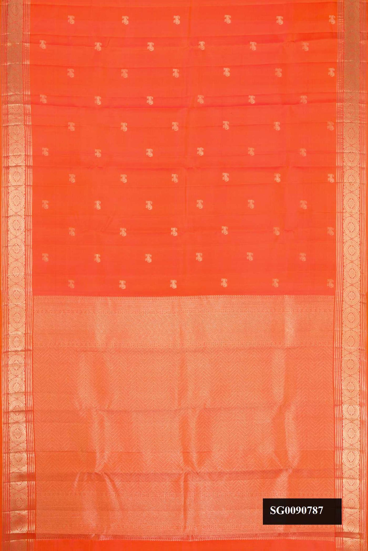 Coral Kanchipuram Silk Saree with Zari Butta on the body and Zari Border.  displayed on a mannequin