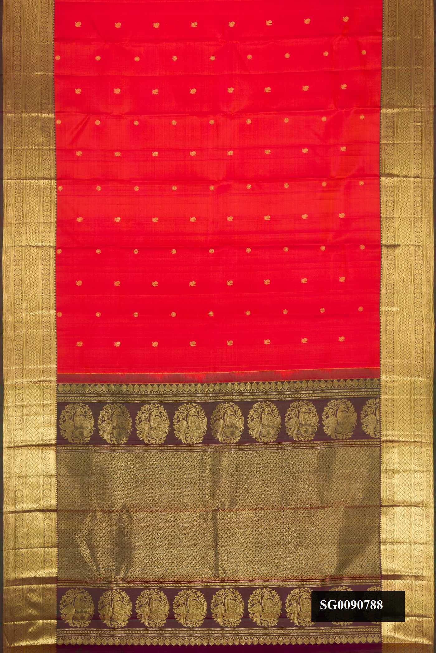 Red Dual Tone Kanchipuram Silk Saree with Zari Butta on the body and Zari Border.  displayed on a mannequin