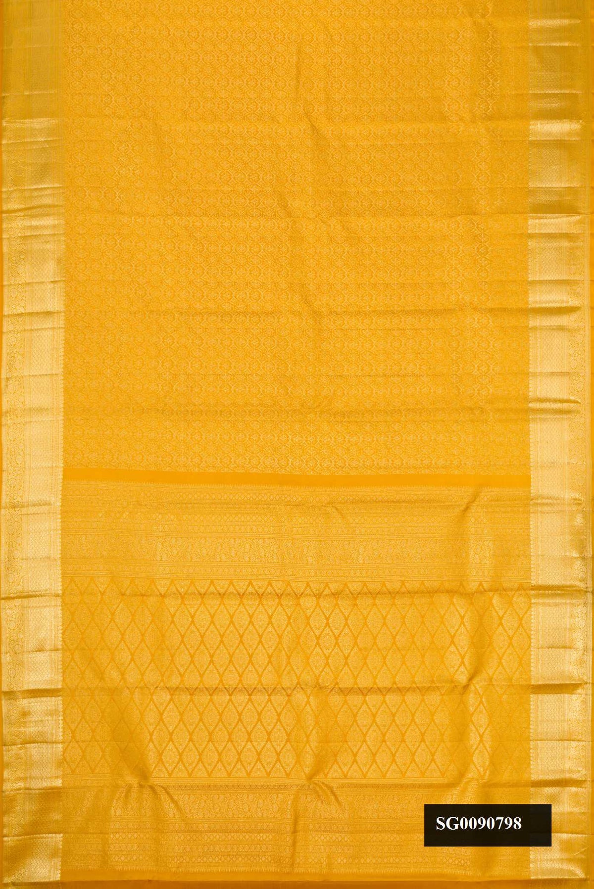 Mustard Dual Tone Kanchipuram Silk Saree with Zari Brocade on the body and Zari Border.  displayed on a mannequin