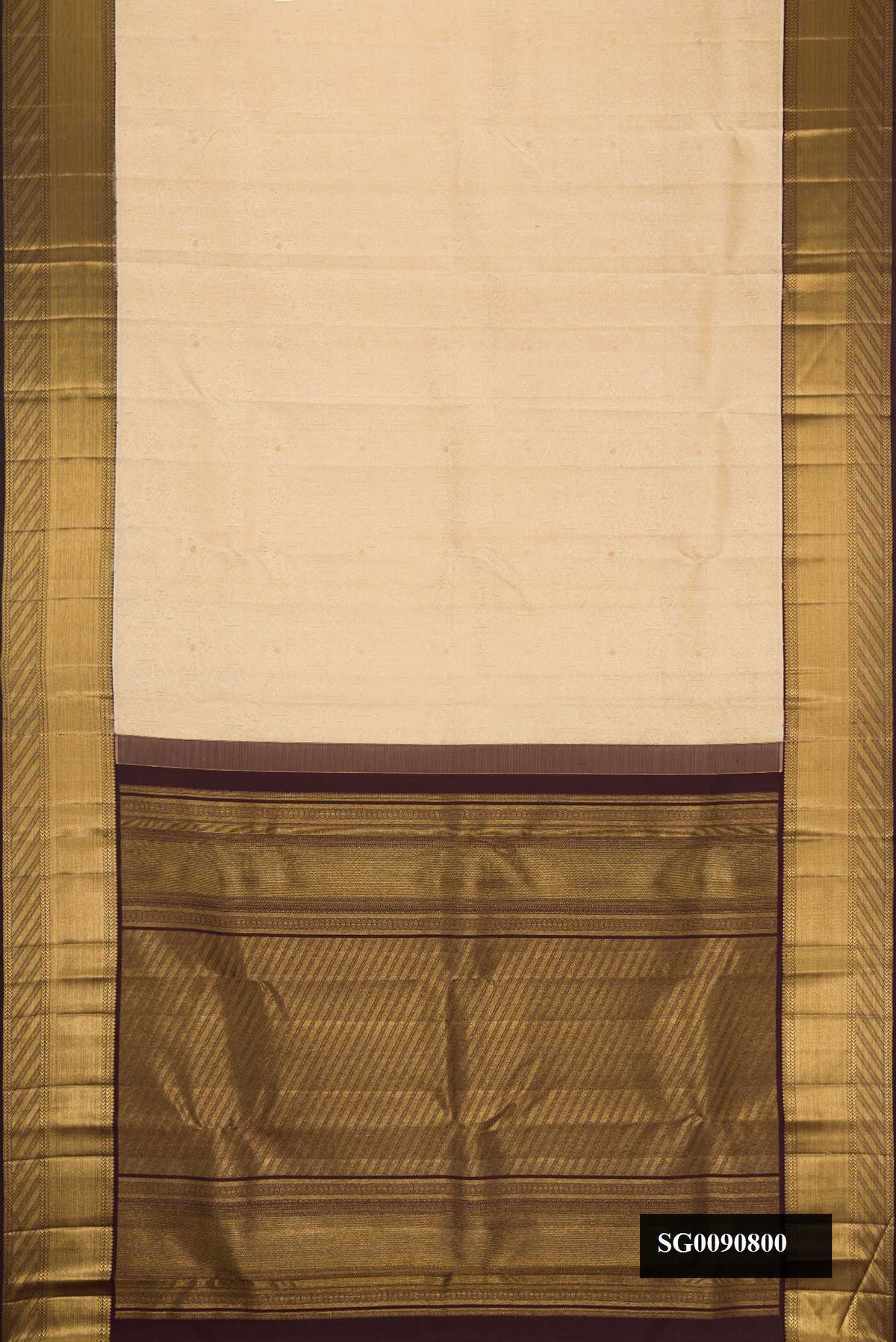 Sandal Dual Tone Kanchipuram Silk Saree with Zari Brocade on the body and Zari Border.  displayed on a mannequin