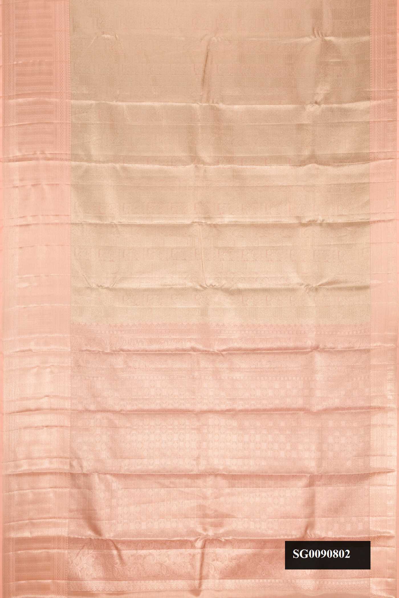 Peach Dual Tone Kanchipuram Tissue Silk Saree with Zari Brocade on the body and Zari Border.  displayed on a mannequin