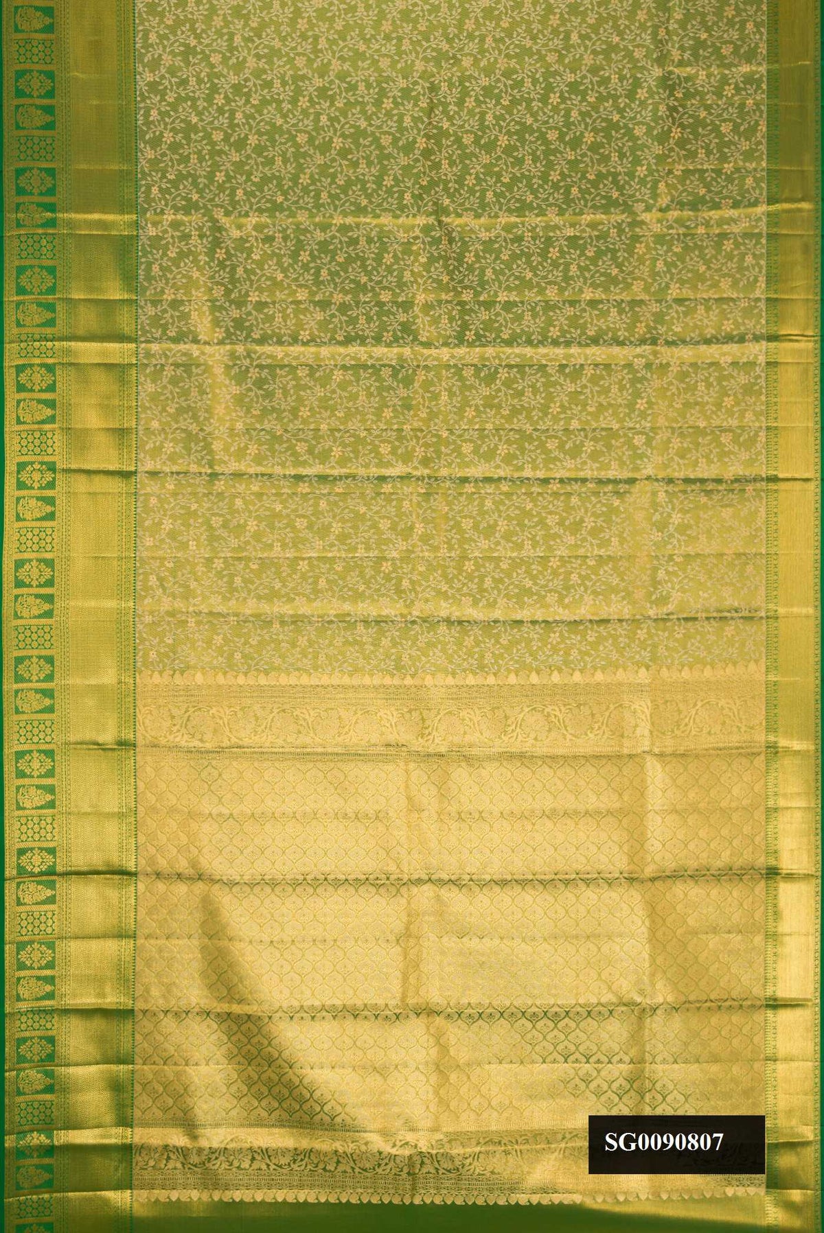Green Dual Tone Kanchipuram Tissue Silk Saree with Zari Brocade on the body and Zari Border.  displayed on a mannequin