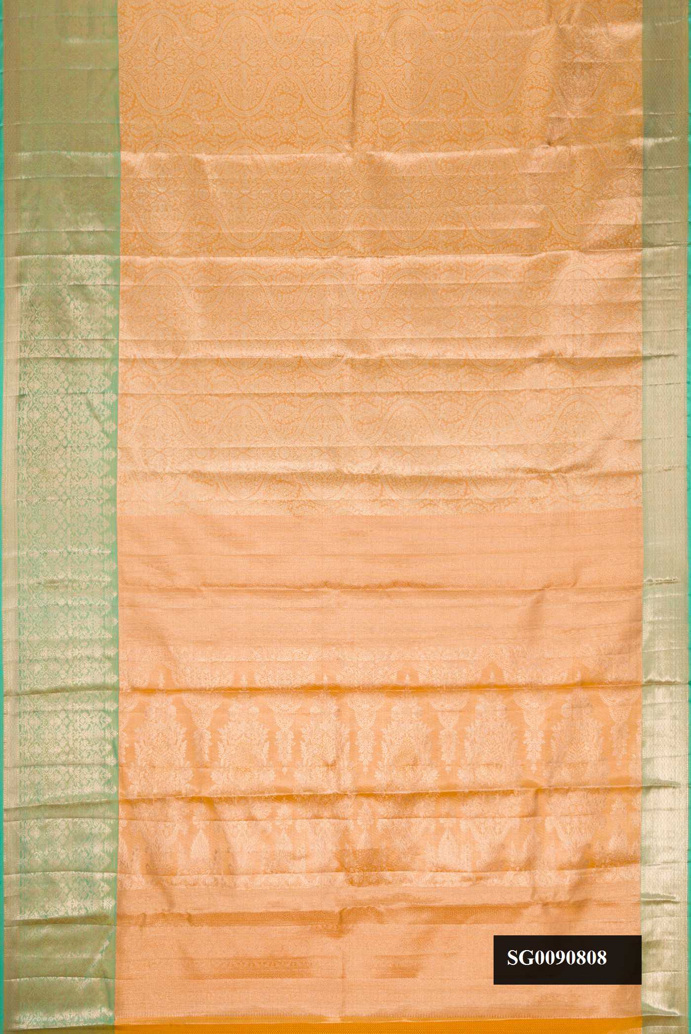 Peach Dual Tone Kanchipuram Tissue Silk Saree with Zari Brocade on the body and Zari Border.  displayed on a mannequin