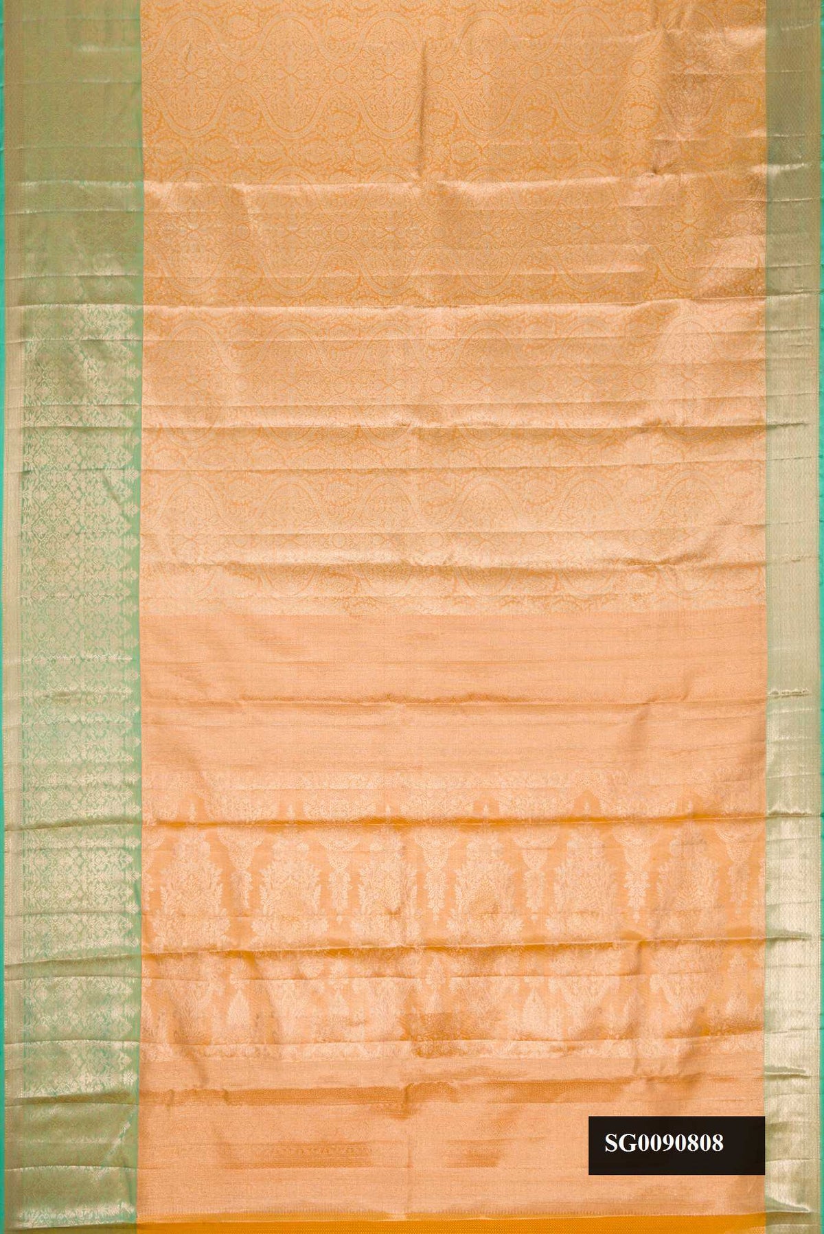 Peach Dual Tone Kanchipuram Tissue Silk Saree with Zari Brocade on the body and Zari Border.  displayed on a mannequin