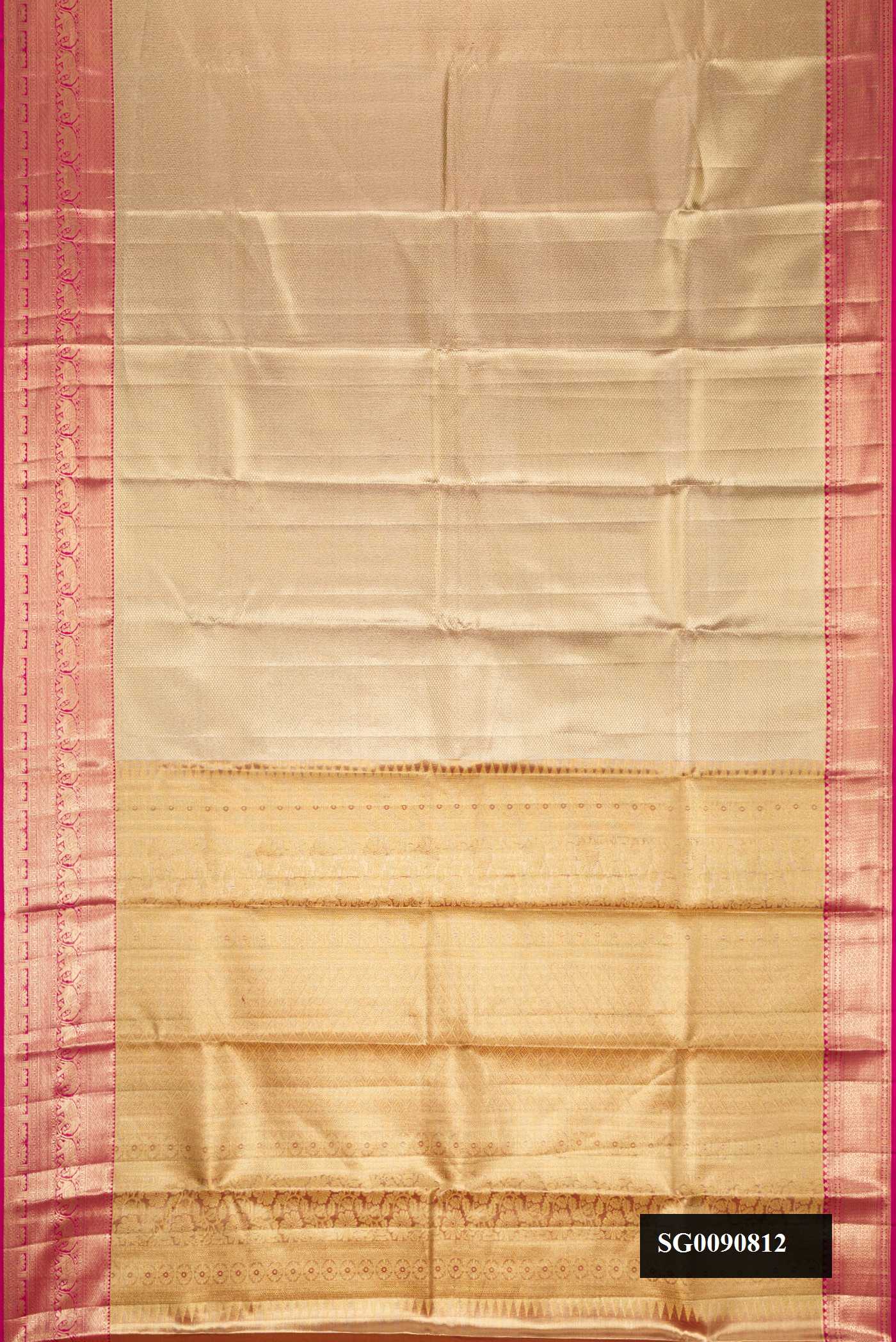 Gold Dual Tone Kanchipuram Tissue Silk Saree with Zari Brocade on the body and Zari Border.  displayed on a mannequin